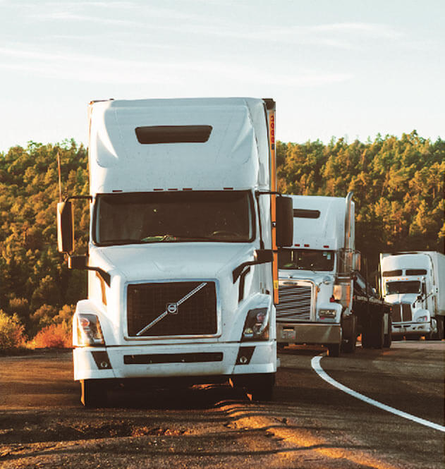 Three Trucks from Sadler Trucking, a Nashville Trucking company, Birmingham Trucking company, Jacksonville Trucking Company, and Memphis Trucking Company